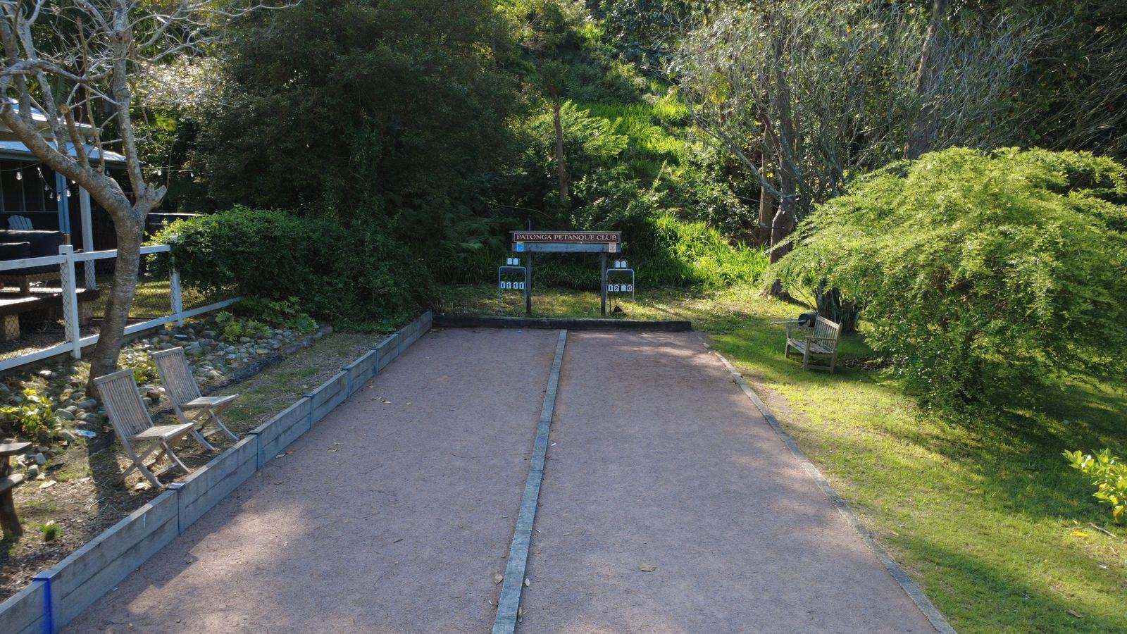 Gravel boules court under the trees